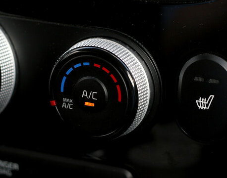 Close-up of temperature and air conditioning dial in vehicle