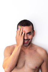 Fototapeta premium gay man rainbow colored nails, no shirt