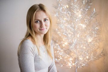 A bright young European girl looks with a smile