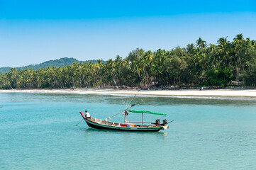 Fototapeta na wymiar Myanmar. Ngapali. Boat at bengal Golf Course