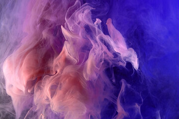 Abstract pink and blue color background. Swirling vibrant hookah smoke, dynamic paint in water.