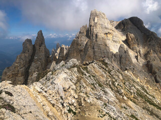 Wonderful view of Latemar in the Dolomites mountains with the rocky mountains of torre di pisa, Predazzo, Trentino Alto-Adige, Italy