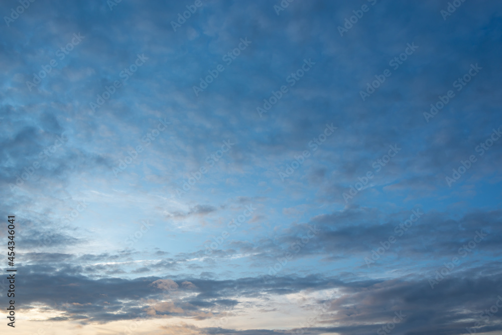 Wall mural blue sky with clouds at sunset, sky remplacement, nature background