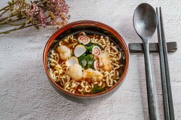 Delicious Japanese udon noodles in a ceramic bowl