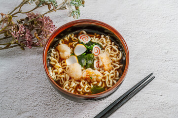 Delicious Japanese udon noodles in a ceramic bowl