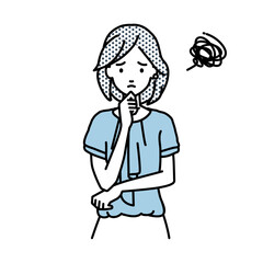 立って手をあごにあてて困っているオフィスカジュアルの女性