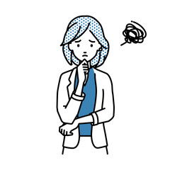 立って手をあごにあてて困っているジャケットの女性