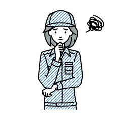 立って手をあごにあてて困っている作業員の女性