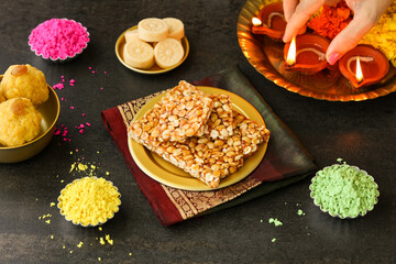 Peanut chikki candy gajak Diwali sweets Indian Sweet dessert mithai festival dish Dussehra Holi...