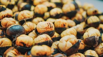 Burned chestnuts close up view