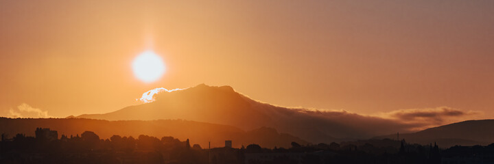 panoramic photograph of the Sainte-Victoire mountain in the light of a summer morning