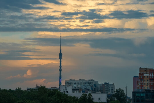 Sunset cloudy sky over the city of Moscow and the high spire of the Ostankino TV tower