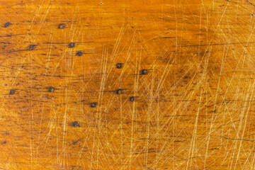 Wood texture. Old kitchen board. Light brown wood. Spoiled board.