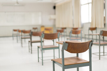 Empty classroom without students due to COVID-19 pandemic and schools being closed. Back to school concept..