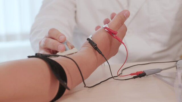 Patient nerves testing using electromyography at medical center