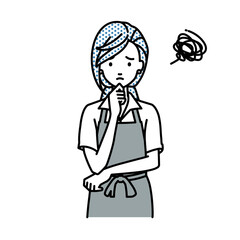 立って手をあごにあてて困っているカフェ店員の女性