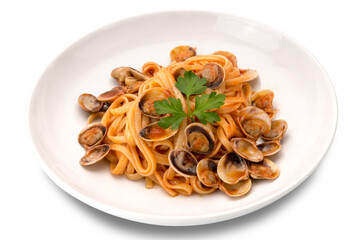 Linguine pasta in a tomatoes clams sauce with parsley served on a white plate isolated on white