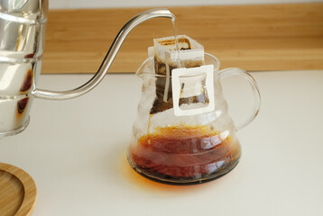 Drip bag coffee brewing process. Easy simple brew method, new trend