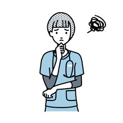 立って手をあごにあてて困っている看護師の女性