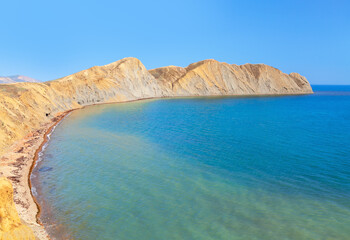 Fototapeta premium Mull Khameleon in Crimea , Black Sea Coast . Coastal ridge and bay of water