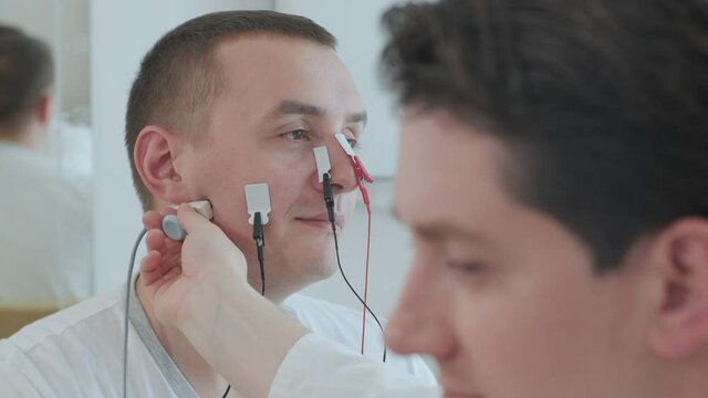 Patient nerves testing using electromyography at medical center