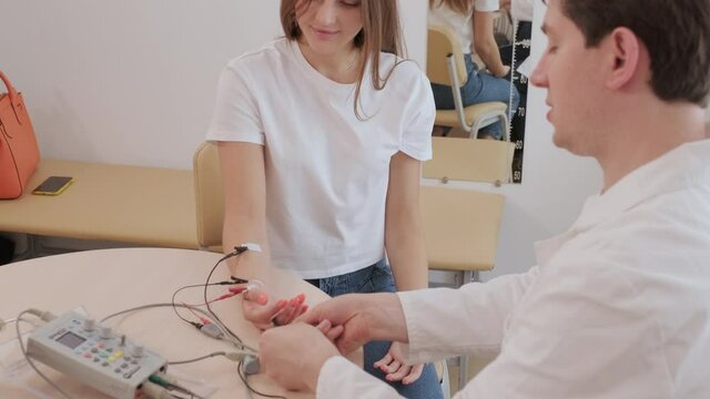 Patient nerves testing using electromyography at medical center