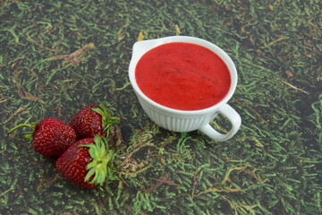 Homemade strawberry dressing in a jug
