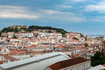 Fototapeta na wymiar Beautiful view of the downtown of the city of Lisbon from the Sao Pedro de Alcantara viewpoint, with the Pombaline downtown and the Sao Jorge Castle.