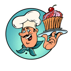 sweet cupcake basket with a cherry in the hands of the cook. Confectionery product