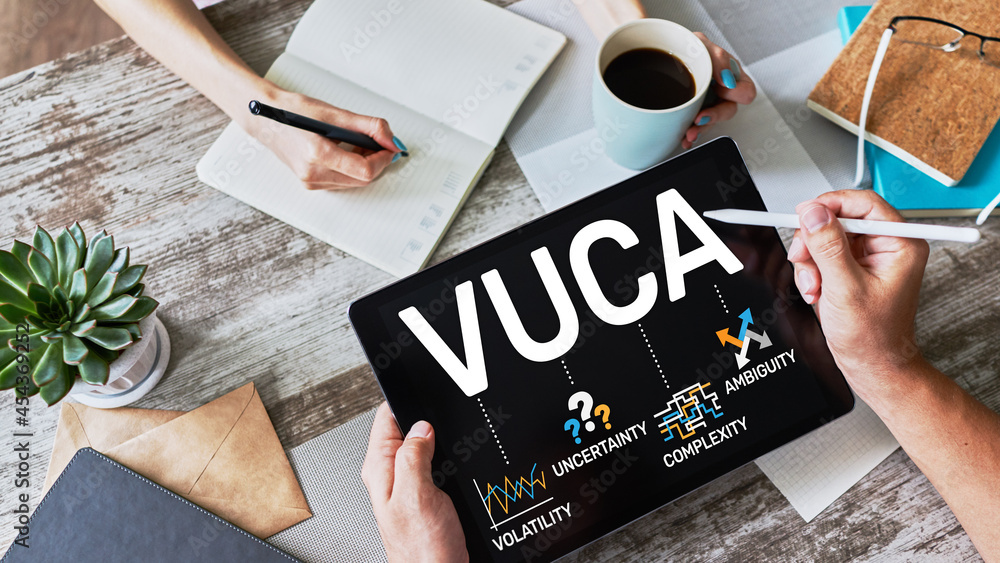 Poster vuca world concept on screen. volatility, uncertainty, complexity, ambiguity