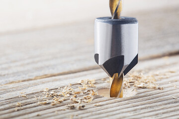 Countersink drill bit make sink in hole for screw in old wooden plank