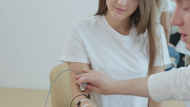 Patient nerves testing using electromyography at medical center