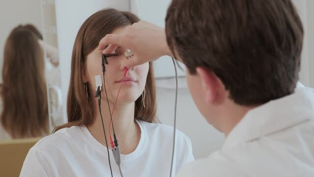 Patient nerves testing using electromyography at medical center
