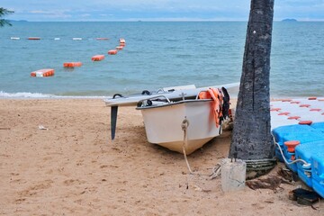 Sailing boat standing on the beach. Pattaya, Thailand.
