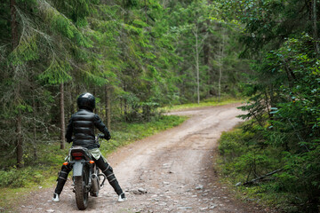 girl on a motorcycle in the open air. the way of life of a real person.