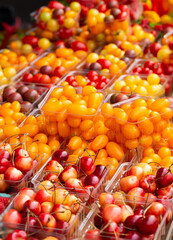 Rainier cherries and cherry tomatoes at a local outdoor market