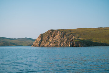 Fototapeta premium Cliffs on Olkhon Island. Lake Baikal is a rift lake located in southern Siberia, Russia. The largest freshwater lake by volume in the world. A Natural Wonder Of The World.