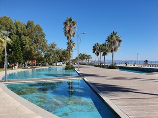 Wooden footbridges, wooden platforms, ponds and water together make the elegant promenade of Limassol, Lemesos, Cyprus