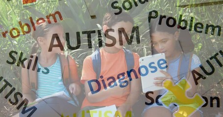 Animation of colourful puzzle pieces and autism text over school children using tablets - Powered by Adobe