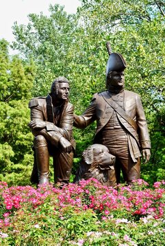 St. Charles, Missouri, USA: Lewis and Clark statue in Frontier Park near Missouri River. A bronze monument features Meriwether Lewis and William Clark and Clark's Newfoundland dog, Seaman.