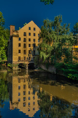 Fototapeta na wymiar Old color big house mill in Litomerice town in north Bohemia in summer evening