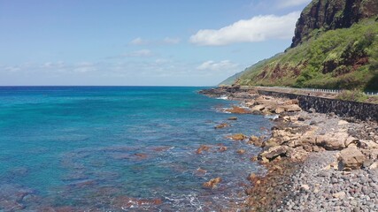 Aerial view from above down Drone shot. Beautiful tropical beach sea with white sand. Top view. Empty and clean beach in summer season on Oahu Hawaii Island.