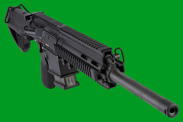 black automatic rifle against the background of chroma key. isolated image of a weapon.