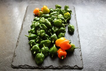 Chillies on a slate placemat