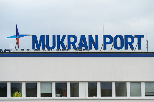 Sassnitz Mukran, Germany, August 20, 2020: Mukran Port letters and logo sign on the terminal and office building for ferries and cargo freight for example pipes for the gas pipeline north stream 2