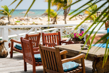 Fototapeta na wymiar Beautiful Deck Patio Table in Ocean Point Resort in St. John's Antigua