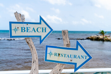 Beach and Restaurant Arrow Sign at Ocean Point Resort in St. John's Antigua