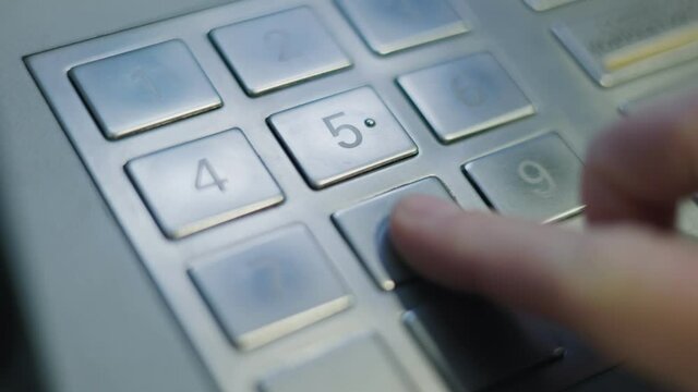 finger pressing enter button on a keyboard ATM EPP
