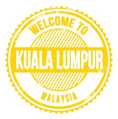 WELCOME TO KUALA LUMPUR - MALAYSIA, words written on yellow stamp