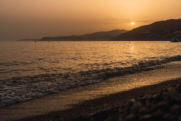 View of a nature and calm scene of the beach during the sunset. Travel concept.